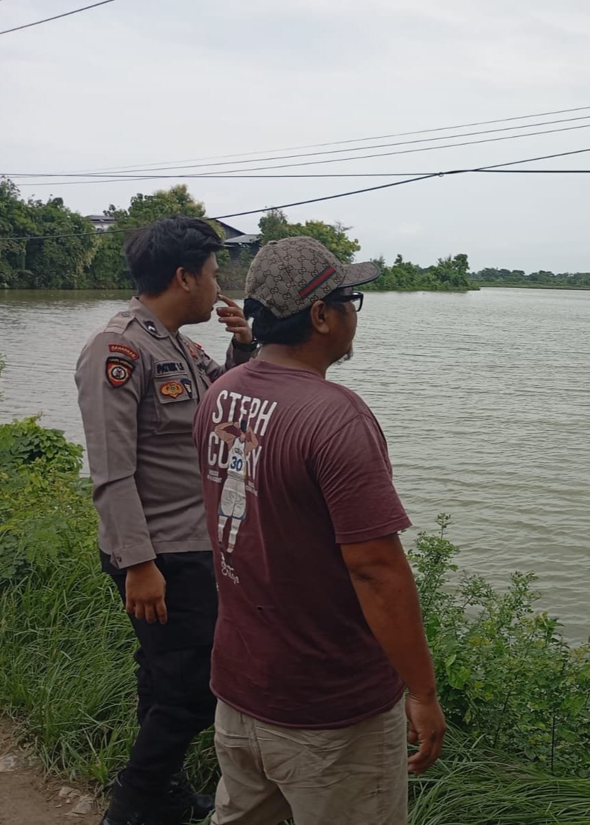 Dukung Program ketahanan pangan daerah, Polsek Duduksampeyan meninjau Tambak Ikan Bandeng di Desa Pandanan.